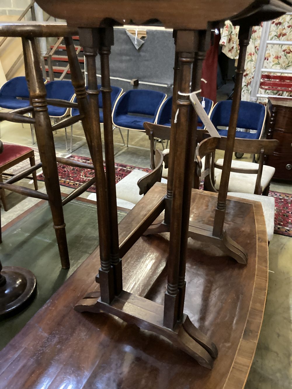 A nest of two Edwardian mahogany tea tables, width 42cm depth 34cm height 66cm